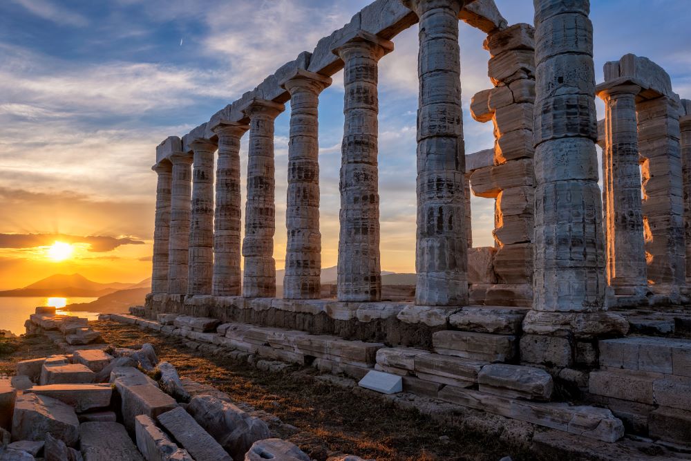 Ancient Greek ruins with sunset in the background. Exploring Ancient Greek history.