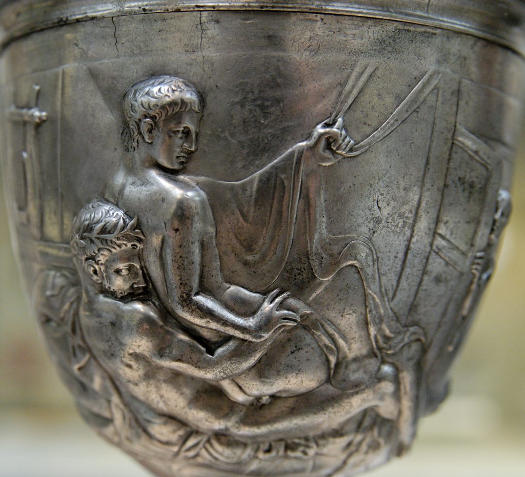 The Not-So Taboo Culture of Gay Relationships and Male Erotic Massage in Ancient Rome. Ancient Roman bowl with engraving depicting scene of gay romantic relationship.