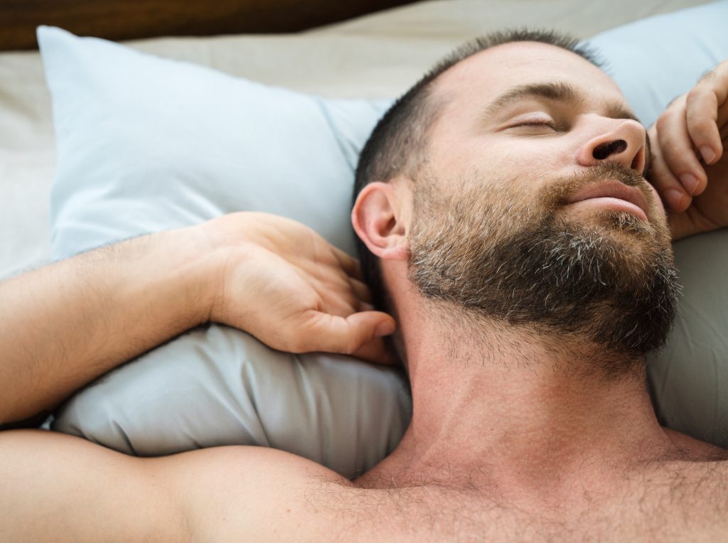 Bearded man sleeping peacefully